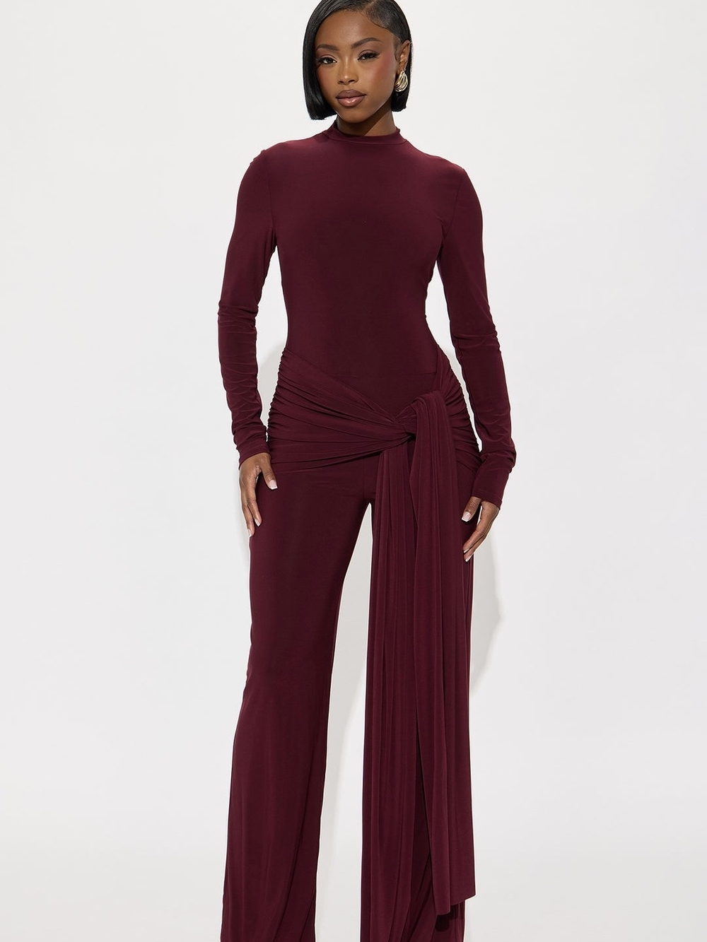 Fashion Nova Lainey Long Sleeve Wide Leg Jumpsuit in Burgundy.
